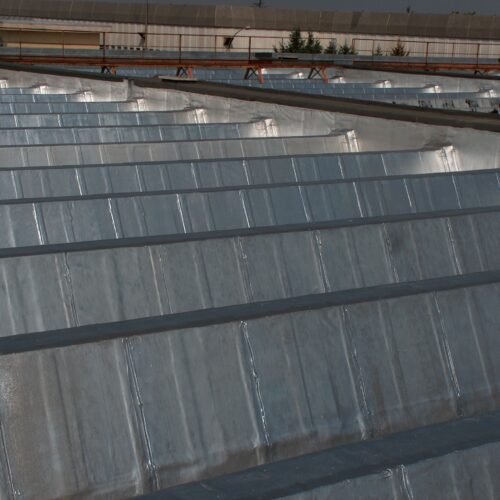 vernice termoisolante protettiva metallizzante su shed di michelin cuneo